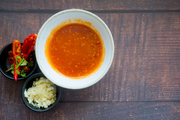 Sauce for Shabu shabu style with side dish on wood table