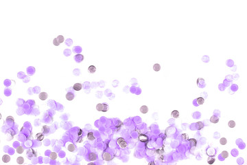 Delicate violet confetti isolated on white background.