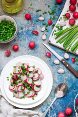 Salad with radish, green onions and pink salt