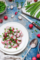 Salad with radish, green onions and pink salt