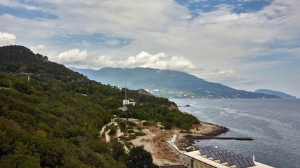 Russia. Crimea. Surroundings of the sanatorium Kurpaty. Yalta is visible behind the cape