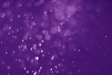 Bokeh purple proton background abstract