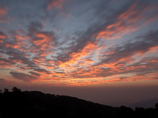 Fototapeta premium Golden light of the morning sunrise, reflected with clouds.
