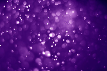 Bokeh purple proton background abstract