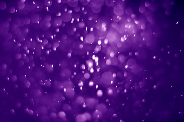 Bokeh purple proton background abstract
