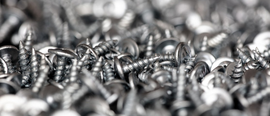 Sharp screws as abstract background