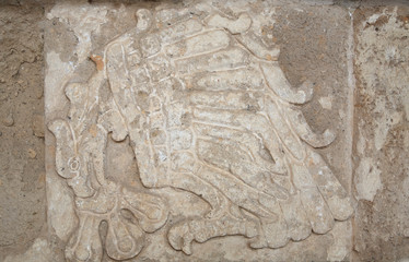 Stone carving on pyramids at The Ancient City of Tula, Mexico