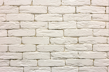 Close-up of white painted whitewashed solid brick wall. Abstract copy space background,...