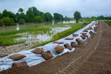 flooding of river embankments reinforcement to delimit the full emilia romagna moderate climatic...