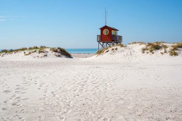 The life guard tower on a sand dune at the beach of Skanor Falsterbo in Skane Sweden