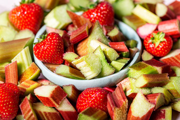 Close up of Pieces of Raw and Freshly Cut Rhubarb and Strawberries, Background Image