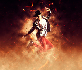 Man break dancing on fire background