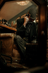 man talk on the phone in the mirror vintage style classic retro
