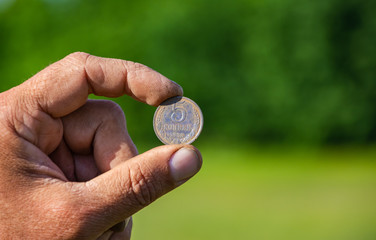 Archaeological finds, old coins found and removed from the ground.