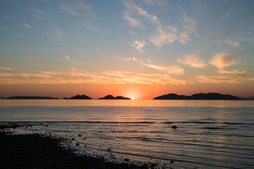 Naklejka premium Sunset in the beach in the California coast.