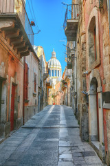 Walking around the old streets of  baroque town Ragusa Ibla in Sicily