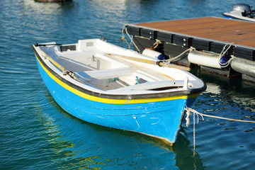 Obraz premium Small yachts and fishing boats in marina of Lerici town, a part of the Italian Riviera, Italy.
