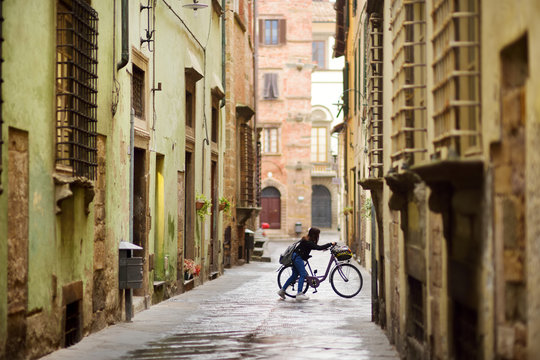 Fototapeta Beautiful medieval streets of Lucca city, Tuscany, Italy.