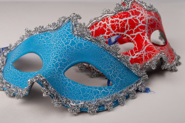 masquerade masks red and blue on a white background