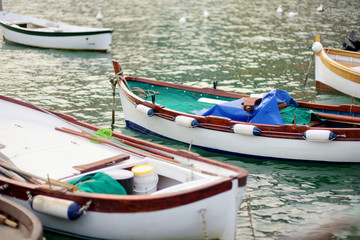 Fototapeta na wymiar Small yachts and fishing boats in marina of Porto Venere town, a part of the Italian Riviera, Italy.