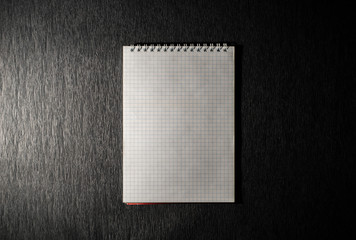 Notepad on a black background