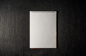 Notepad on a black background