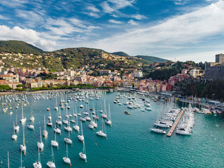 Fototapeta na wymiar Aerial view of small yachts and fishing boats in Lerici town, a part of the Italian Riviera, Italy.