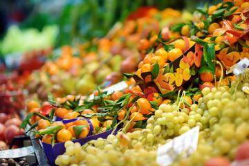 Assorted organic fruits sold on a marketplace in Genoa, Italy