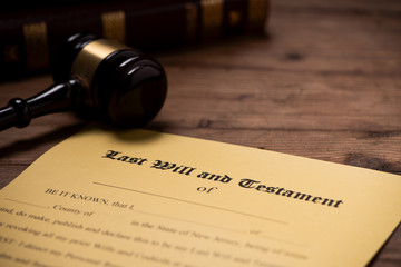 A gavel on top of a Last Will and Testament contract