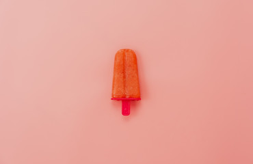 Table top view aerial image of food for summer holiday background concept.Flat lay red watermelon ice cream pop stick by homemade on modern rustic yellow paper wallpaper.pastel & minimal style.