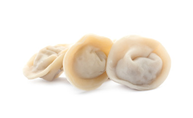 Fresh tasty boiled dumplings on white background