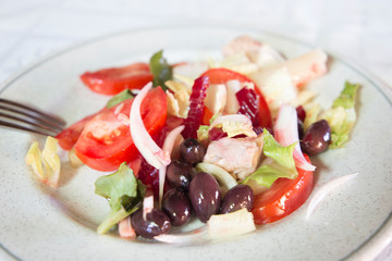 Tomato salad with black olives and tuna fish Spain