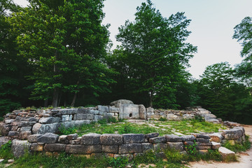 Ancient tiled dolmen in the valley of the river Jean. Monument of archeology megalithic structure