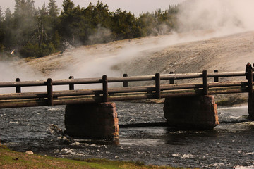 bridge near geysers in yellowstone national park