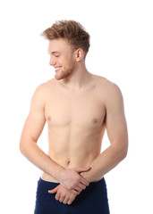 Fototapeta premium Portrait of young man with slim body on white background