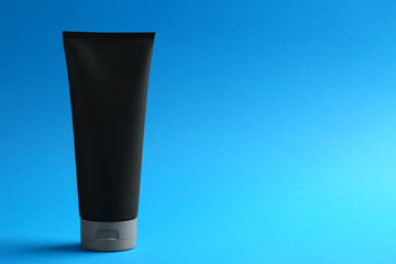 Men's cosmetic product on color background. Space for design