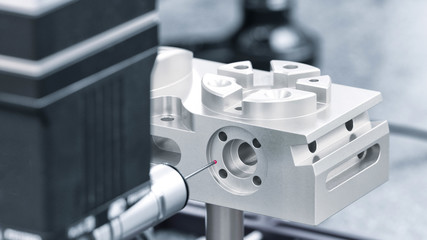 Operator inspection dimension metal parts by CMM after machining process in industrial factory.