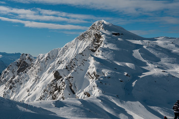  A ski resort’s trail with bright and dark shades