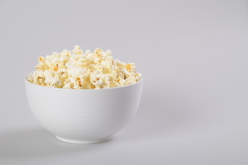 Popcorn bowl isolated on white, clipping path included.