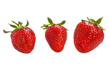 Three juicy strawberries isolated on white background