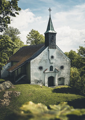 Church in the bavarian forest with trees aorund