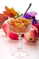Apple jam in a vase on the table