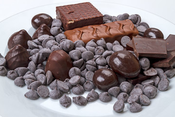 Different types of chocolate on  plate