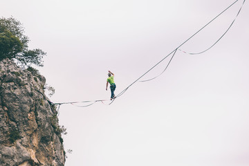Highliner balances over the abyss.