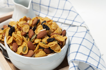 Cornflakes and cereal breakfast, Almond, raisin sultana, mixing to healthy food.