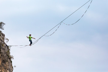 Highliner balances over the abyss.