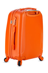 Travel orange suitcase isolated on white background. Close-up.