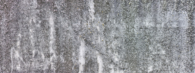 Concrete or cement wall. Old dirty cement texture with defects. Grunge surface with cracks and weathered.