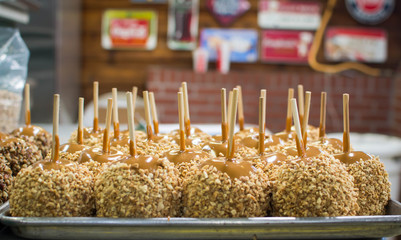 Close up of caramel apples with nuts