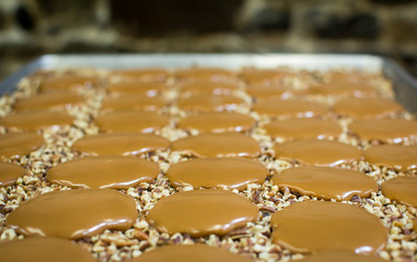 Chocolate covered bear claw in a pan